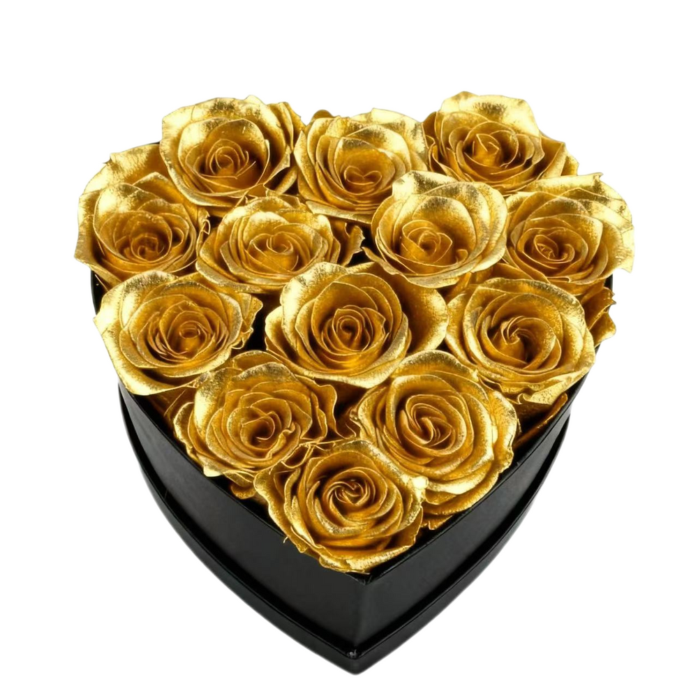A luxurious heart box filled with 13 or 20 handcrafted forever roses, featuring a Parisian black hat-box design with gold detailing. Bloom 3+ years.