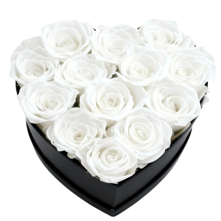 A luxurious heart box filled with 13 or 20 handcrafted forever roses, featuring a Parisian black hat-box design with gold detailing. Bloom 3+ years.