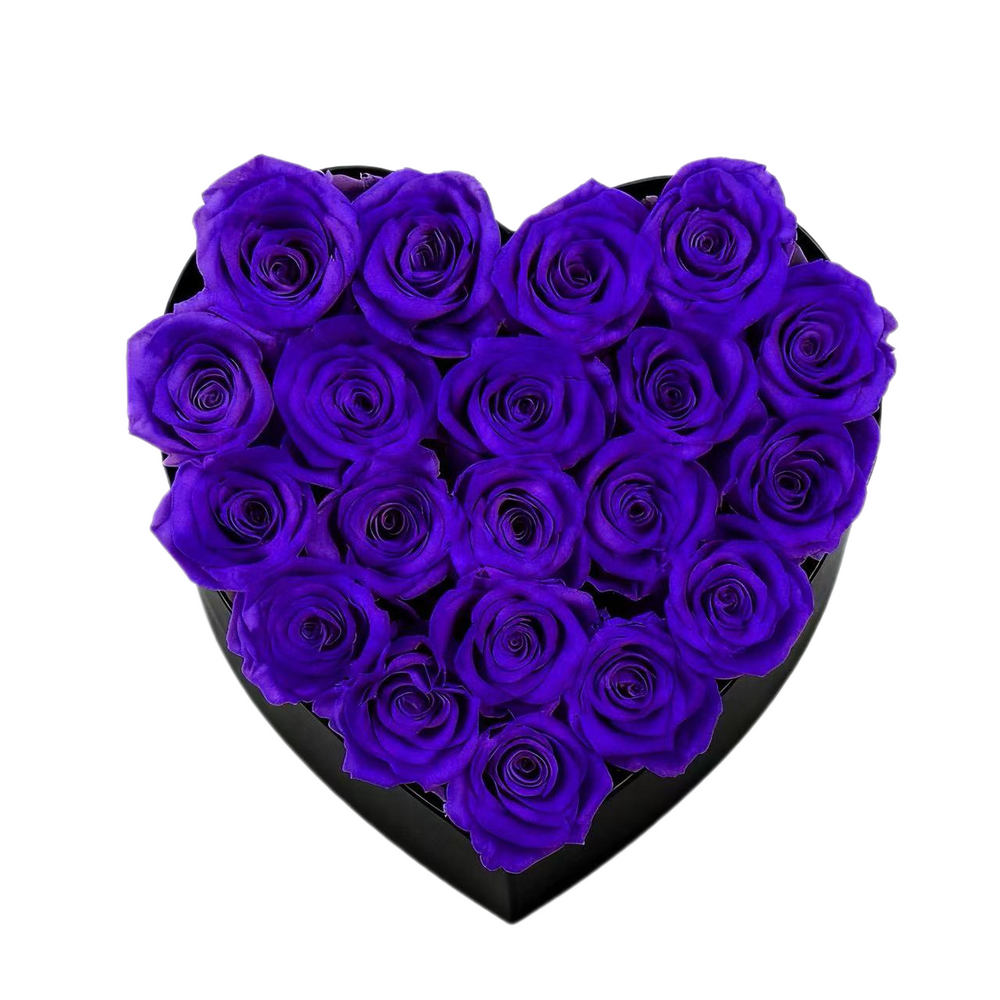 A luxurious heart box filled with 13 or 20 handcrafted forever roses, featuring a Parisian black hat-box design with gold detailing. Bloom 3+ years.