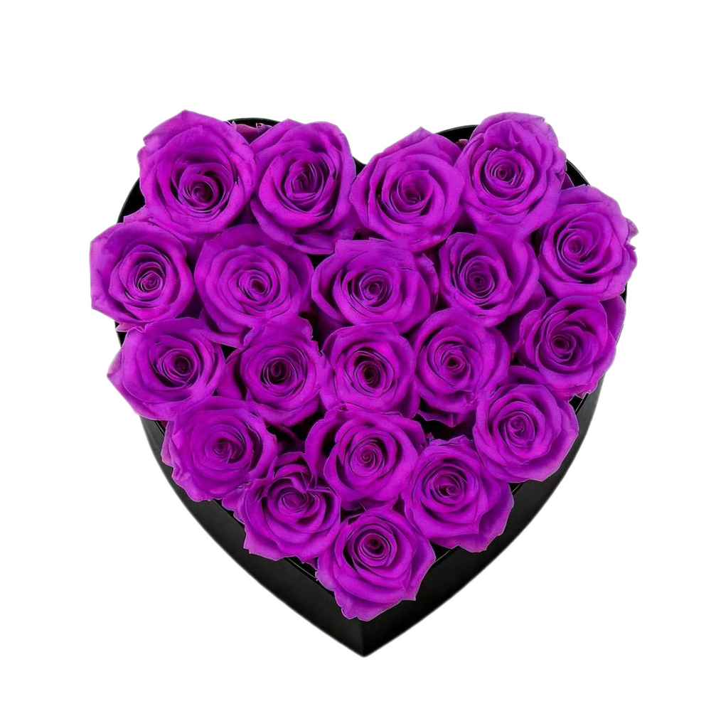 A luxurious heart box filled with 13 or 20 handcrafted forever roses, featuring a Parisian black hat-box design with gold detailing. Bloom 3+ years.