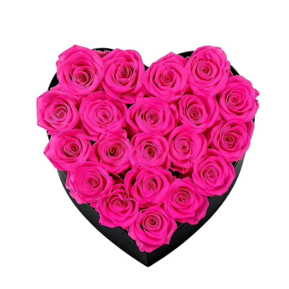A luxurious heart box filled with 13 or 20 handcrafted forever roses, featuring a Parisian black hat-box design with gold detailing. Bloom 3+ years.