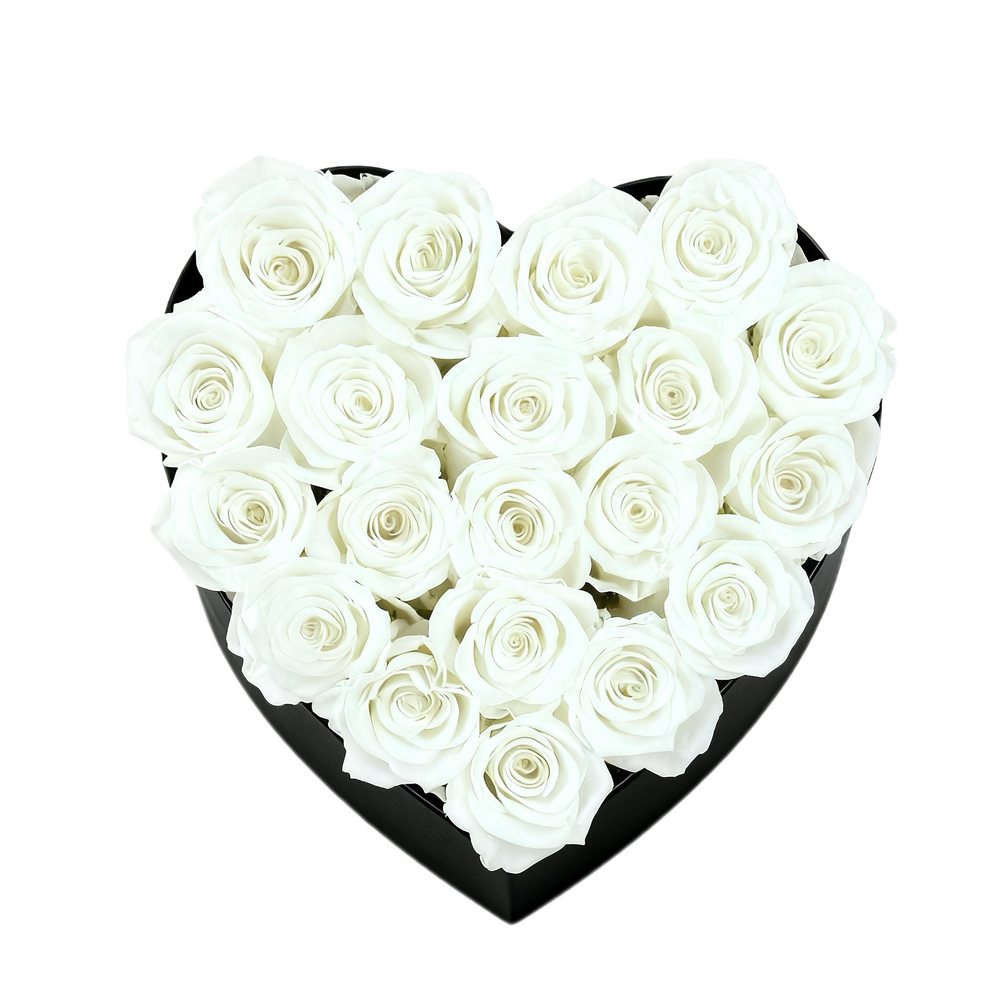 A luxurious heart box filled with 13 or 20 handcrafted forever roses, featuring a Parisian black hat-box design with gold detailing. Bloom 3+ years.