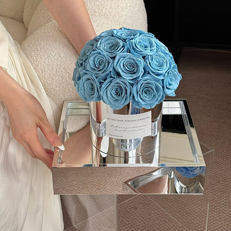 Embrace elegance with our Eternal Flower Hug Bucket, featuring vibrant preserved roses in a mirrored luxury design — a perfect gift for birthdays, anniversaries, mother's day and romantic surprises. Bloom 3+ years.