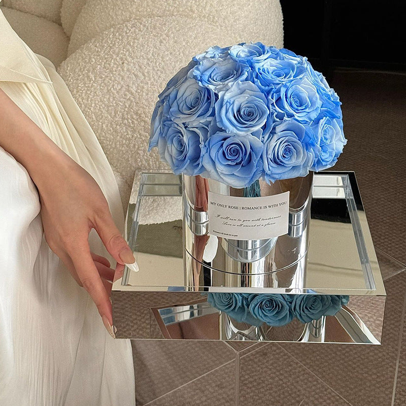 Embrace elegance with our Eternal Flower Hug Bucket, featuring vibrant preserved roses in a mirrored luxury design — a perfect gift for birthdays, anniversaries, mother's day and romantic surprises. Bloom 3+ years.