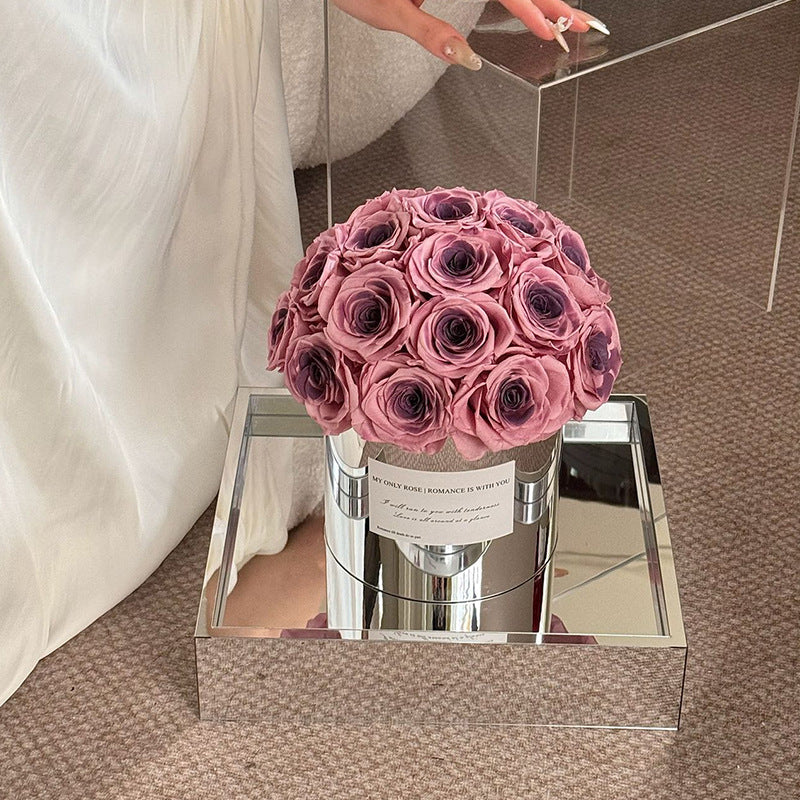 Embrace elegance with our Eternal Flower Hug Bucket, featuring vibrant preserved roses in a mirrored luxury design — a perfect gift for birthdays, anniversaries, mother's day and romantic surprises. Bloom 3+ years.