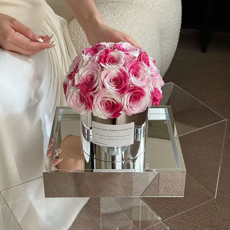 Embrace elegance with our Eternal Flower Hug Bucket, featuring vibrant preserved roses in a mirrored luxury design — a perfect gift for birthdays, anniversaries, mother's day and romantic surprises. Bloom 3+ years.