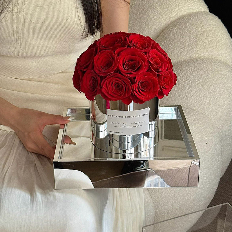 Embrace elegance with our Eternal Flower Hug Bucket, featuring vibrant preserved roses in a mirrored luxury design — a perfect gift for birthdays, anniversaries, mother's day and romantic surprises. Bloom 3+ years.