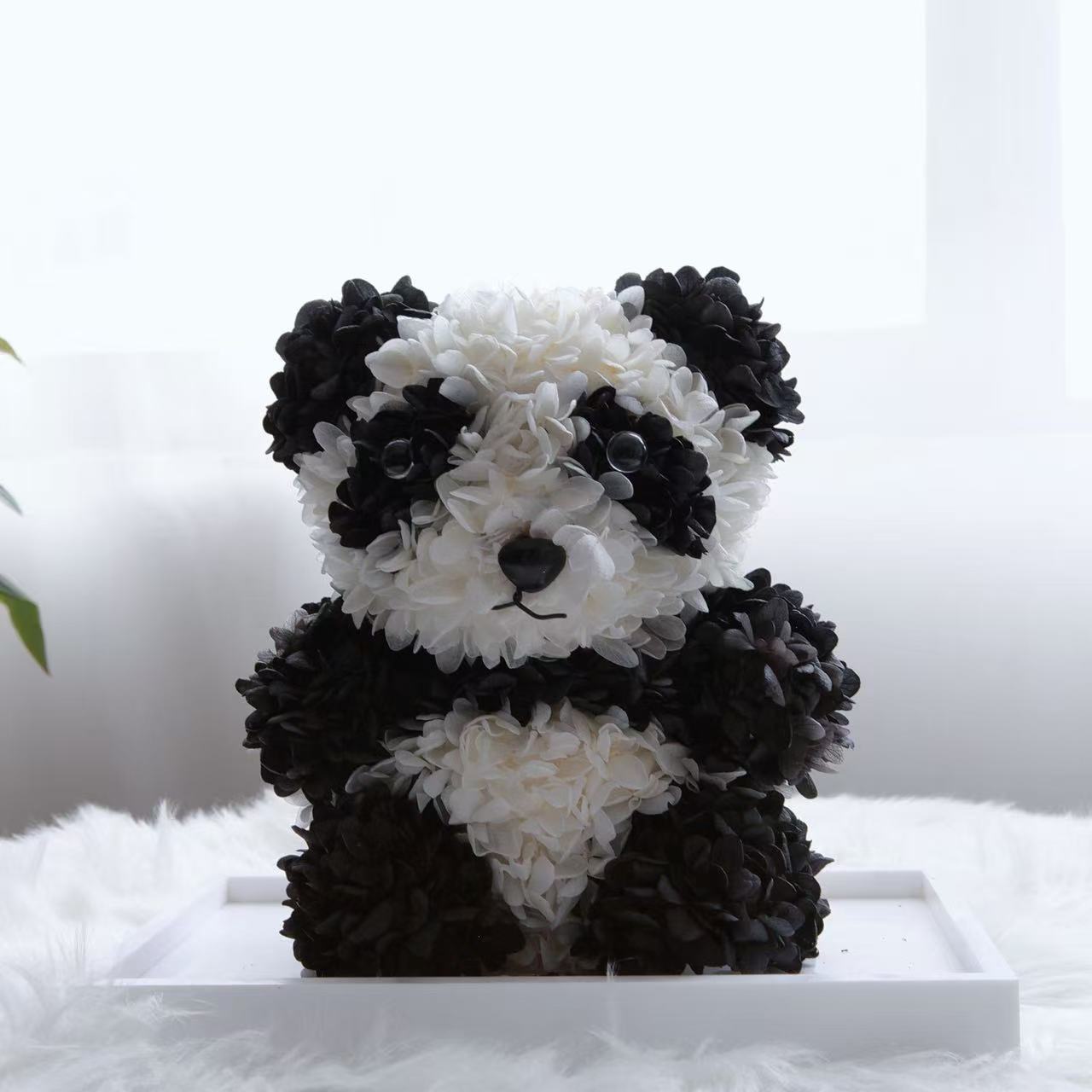 This Chinese Panda fully covered high quality preserved Hydrangeas ,the petals are layered, simulating the plump body and fluffy fur texture of a panda.