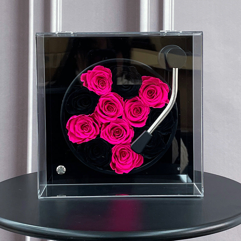 Our Eternal Roses Gramophone Arrangement, a luxurious preserved flower gift designed to capture your hearts. Each rose is carefully arranged in a vintage-inspired gramophone base. Perfect for Valentine’s Day, birthdays, anniversaries, or romantic surprises. Bloom 3+ years.