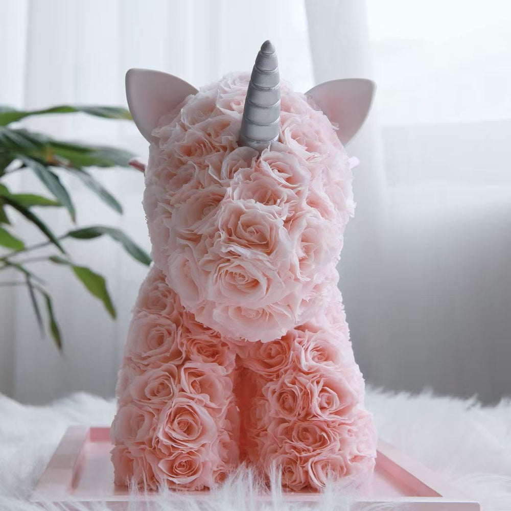 Luxury preserved rose unicorn in sweet pink, handcrafted with dozens of delicate roses. Perfect for Valentine’s Day, birthdays, baby showers, or home décor. Bloom 3+ years.