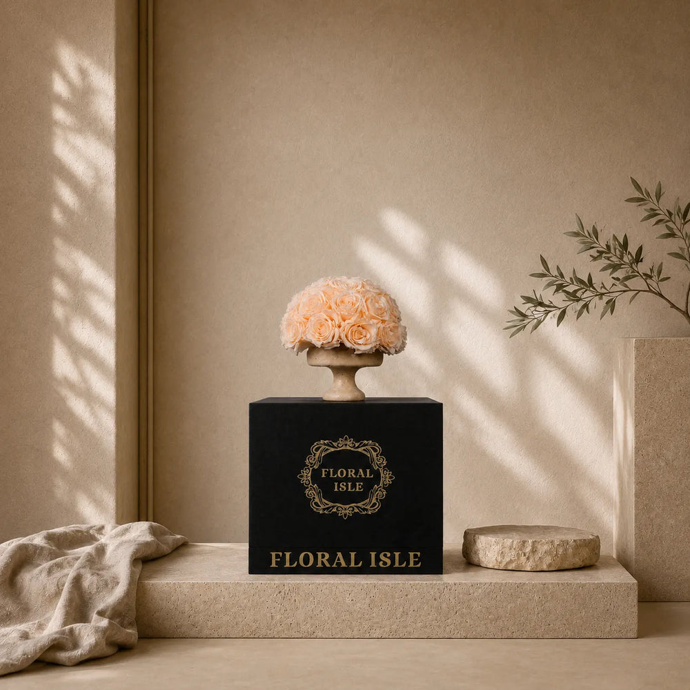 Premium black gift box with an elegant golden logo for luxury preserved roses.